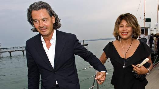 Singer Tina Turner and her long-term German partner Erwin Bach arrive for the premiere of Giacomo Puccini's "Tosca" in Bregenz