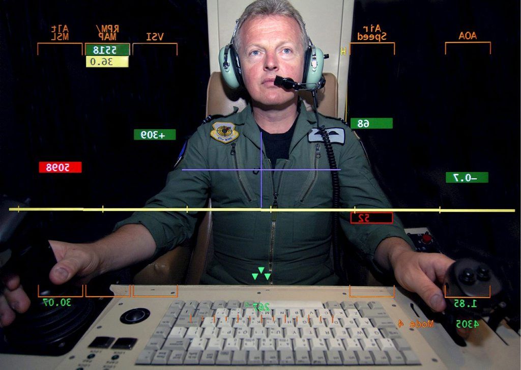 A Flight Lieutenant of 1115 Flight, shown at the controls of the Unmanned Aerial Vehicle called Predator.