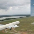 aereo in pista atterraggio con drone