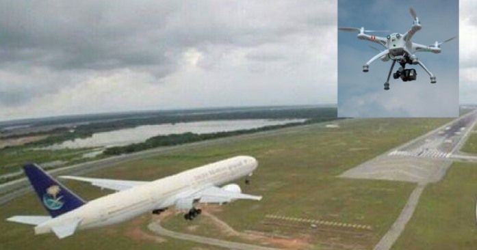 aereo in pista atterraggio con drone